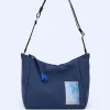 Adolfo Dominguez Bolsos>Bandolera Mediana En Tejido Acolchado Azul Marino